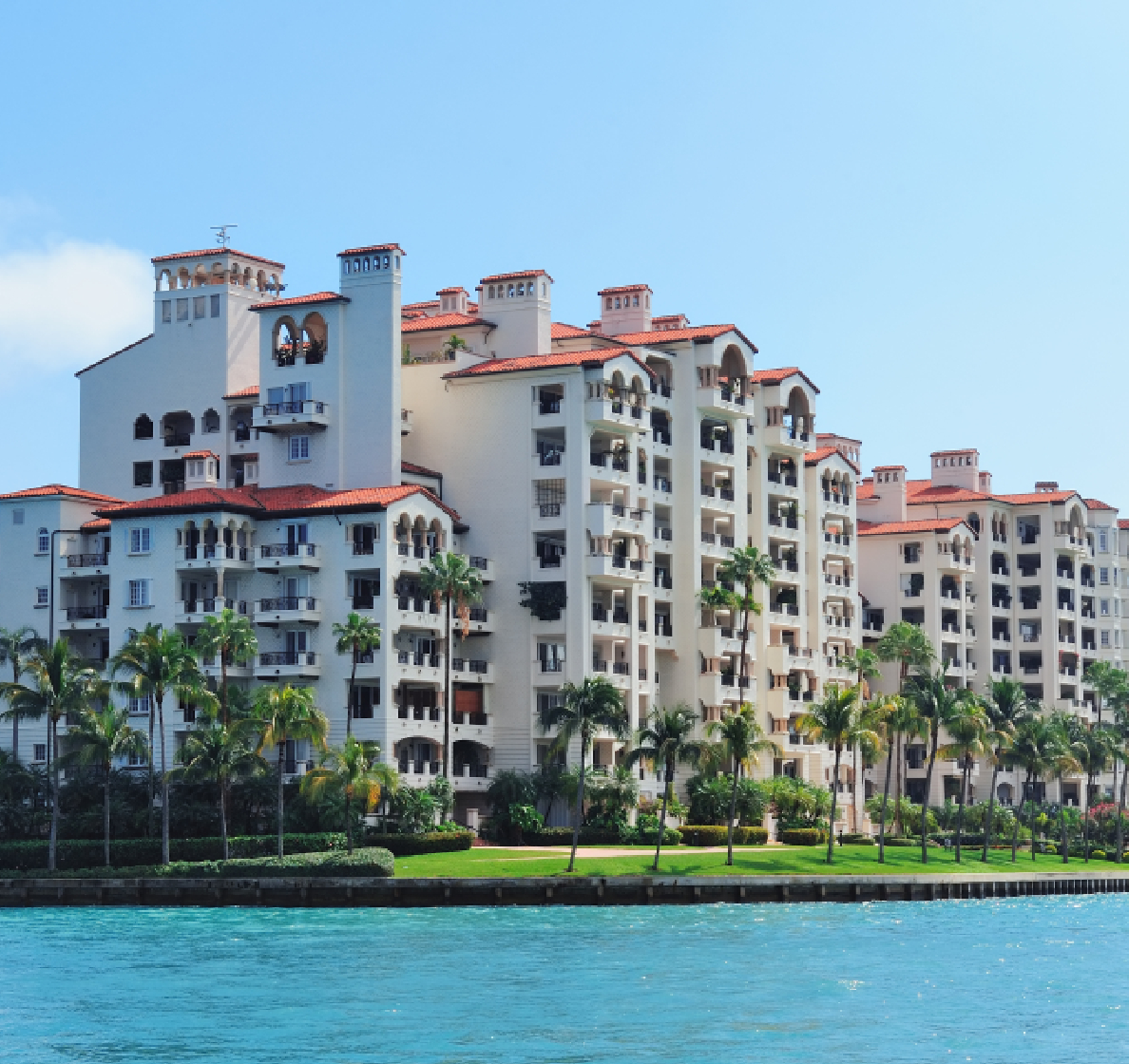 Consulting firm for branded residences team reviewing a luxury project blueprint.